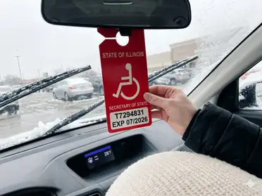 Expectant mother with her Illinois parking placard